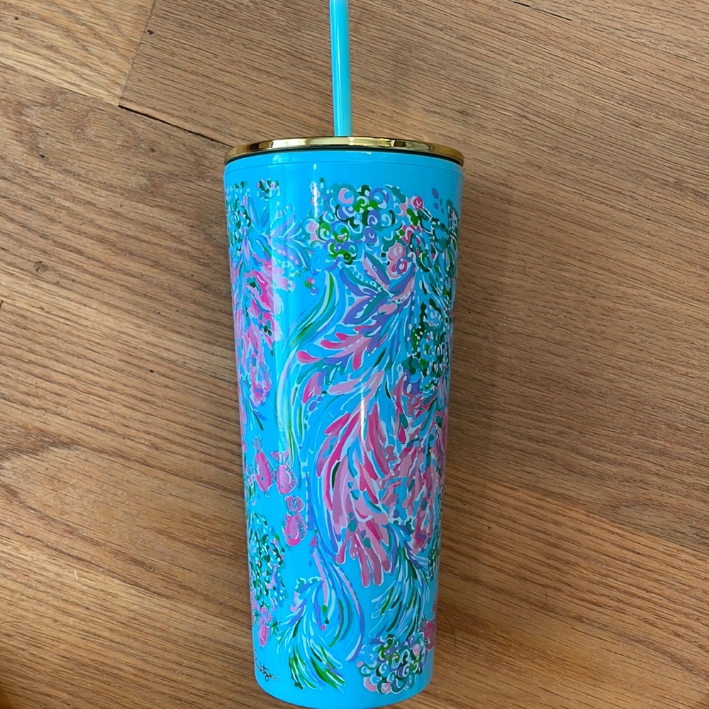 Lilly Pulitzer Tumbler with lid and straw.